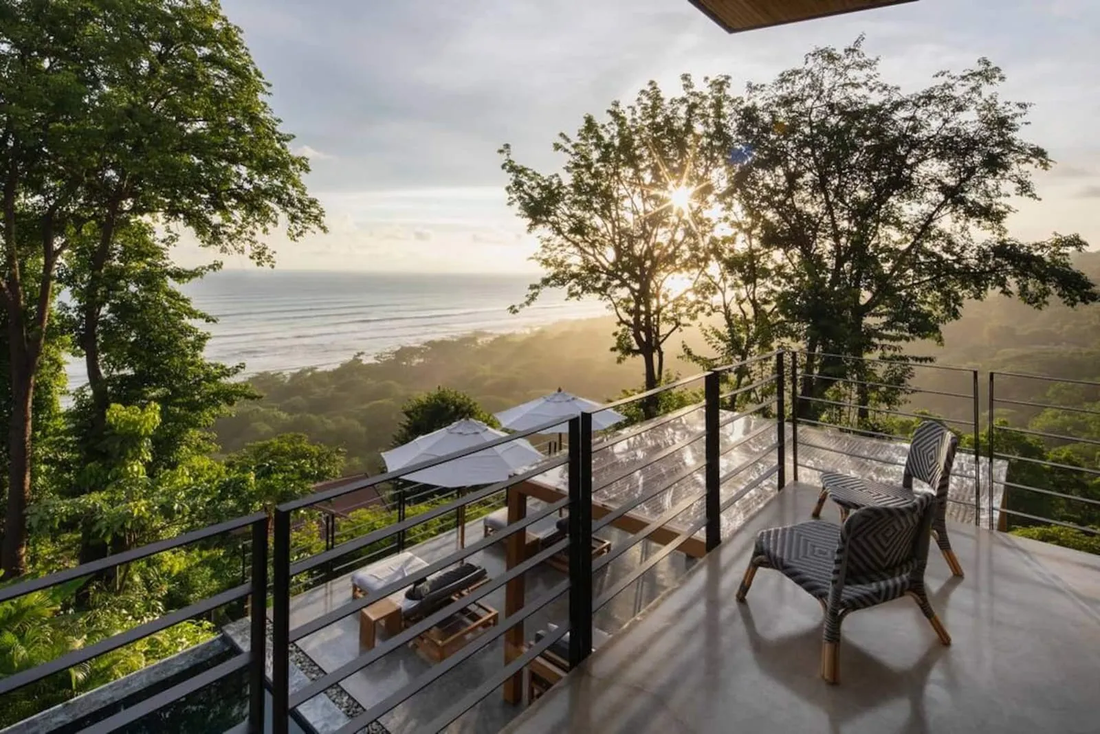 Balcony at sunrise over the trees