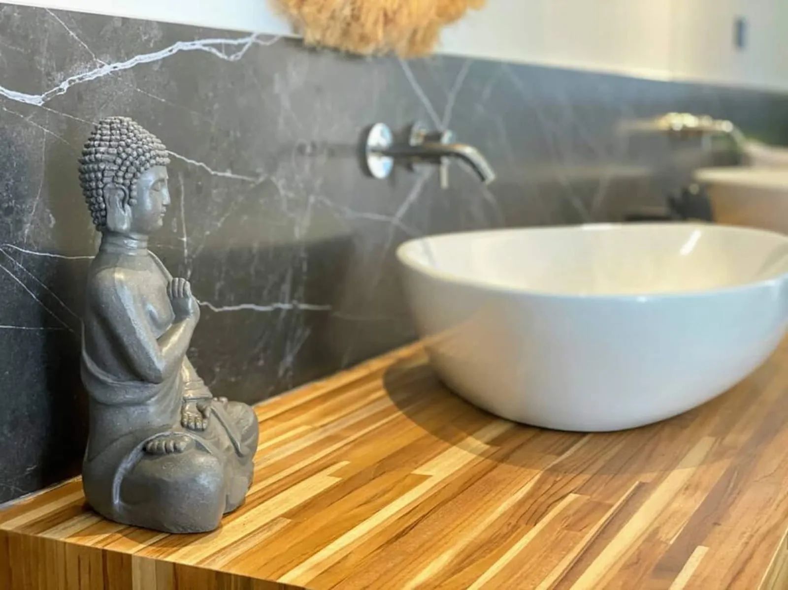 Stone vanity with a vessel sink